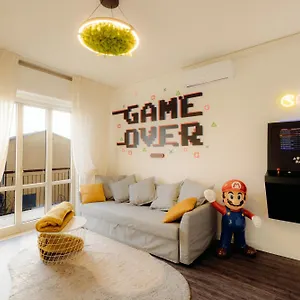 Arcade House Fiera Netflix + Videogame Appartamento